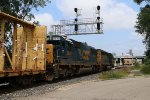 D705 rolls west under the signals as it enters Sunnyside